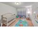 Bright and inviting Bedroom with plush carpeting and playful decor at 1666 Bridwell Ln, Mount Pleasant, SC 29466