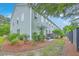 Inviting home exterior with mature landscaping and a charming outdoor space at 1666 Bridwell Ln, Mount Pleasant, SC 29466