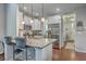 Bright kitchen with granite countertops, stainless steel appliances, and pendant lighting at 1666 Bridwell Ln, Mount Pleasant, SC 29466