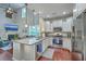Open kitchen with stainless steel appliances, granite countertops, and hardwood flooring at 1666 Bridwell Ln, Mount Pleasant, SC 29466