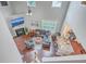 Open-concept living room featuring a fireplace, high ceilings and hardwood floors at 1666 Bridwell Ln, Mount Pleasant, SC 29466