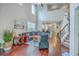 Open living area with hardwood floors and view into kitchen at 1666 Bridwell Ln, Mount Pleasant, SC 29466