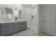 Modern bathroom featuring a double vanity, a glass-enclosed shower, and stylish fixtures at 1713 Banning St, Mount Pleasant, SC 29466