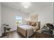 Bedroom showcasing hardwood floors, a bright window, and relaxed decorative elements at 1713 Banning St, Mount Pleasant, SC 29466