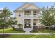 Charming two-story home featuring a welcoming porch, balcony, and beautifully landscaped front yard at 1713 Banning St, Mount Pleasant, SC 29466