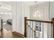 Hallway with white wainscoting, and view into Main Bedroom at 1713 Banning St, Mount Pleasant, SC 29466
