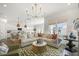 Spacious living room showcasing stylish decor, an open layout, and seamless flow to the kitchen at 1713 Banning St, Mount Pleasant, SC 29466