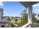 Charming neighborhood view from a covered porch, showcasing the community at 1713 Banning St, Mount Pleasant, SC 29466