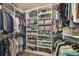Well-organized walk-in closet with custom shelving, hanging rods, and ample storage space at 1713 Banning St, Mount Pleasant, SC 29466