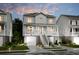 Charming two-story home with a welcoming front porch, a finished garage and manicured landscaping at 1751 Cultivation Lane Dr # 498, Mount Pleasant, SC 29466