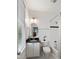 Charming bathroom featuring a vanity with a dark countertop and a shower with a white subway tile surround at 1878 Headquarters Plantation Dr, Johns Island, SC 29455