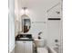Charming bathroom featuring a vanity with a dark countertop and a shower with a white subway tile surround at 1878 Headquarters Plantation Dr, Johns Island, SC 29455