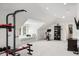 Bonus room offers flexible space, featuring a daybed, exercise area, and a bookcase, ideal for various activities at 1878 Headquarters Plantation Dr, Johns Island, SC 29455