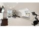 A bonus room featuring high ceilings, recessed lights, a daybed, and exercise equipment at 1878 Headquarters Plantation Dr, Johns Island, SC 29455