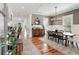 Elegant dining room with modern lighting, stylish decor, and spacious layout perfect for entertaining guests at 1878 Headquarters Plantation Dr, Johns Island, SC 29455