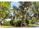 Beautiful two-story home surrounded by lush greenery and mature trees at 1878 Headquarters Plantation Dr, Johns Island, SC 29455