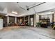Spacious garage with room for storage, bikes, and a golf cart near a door to the home at 1878 Headquarters Plantation Dr, Johns Island, SC 29455