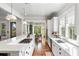 Spacious kitchen featuring white cabinets, granite countertops and open layout at 1878 Headquarters Plantation Dr, Johns Island, SC 29455