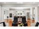 Open kitchen with white cabinetry, stainless steel appliances, and a large island at 1878 Headquarters Plantation Dr, Johns Island, SC 29455