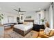 Cozy main bedroom with hardwood floors, comfortable furnishings, and ample natural light at 1878 Headquarters Plantation Dr, Johns Island, SC 29455