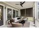 Relaxing porch with comfortable seating, ceiling fan and outdoor ambiance at 1878 Headquarters Plantation Dr, Johns Island, SC 29455
