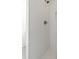 White tiled shower featuring new fixtures and a built-in niche at 1878 Headquarters Plantation Dr, Johns Island, SC 29455