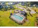 Community pool, playground, and fire pit located in a neighborhood surrounded by green space at 202 Buttercup Ln, Summerville, SC 29486