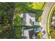 Aerial shot of a well-maintained home and surrounding yard in a residential neighborhood at 202 Buttercup Ln, Summerville, SC 29486