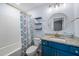 Bathroom featuring a vanity, shower and tub combination, toilet, and accent shelving at 202 Buttercup Ln, Summerville, SC 29486