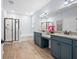 The primary bathroom features double vanity sinks, granite countertops, and a separate shower and tub at 202 Buttercup Ln, Summerville, SC 29486