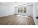 Bright bedroom showcasing hardwood flooring and recessed lighting throughout the room at 202 Buttercup Ln, Summerville, SC 29486