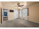Bedroom with light-yellow walls, double doors, and an adjoining bathroom at 202 Buttercup Ln, Summerville, SC 29486