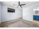 Bedroom with adjoining bathroom, walk-in closet, and neutral carpet at 202 Buttercup Ln, Summerville, SC 29486