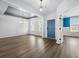 Open concept dining room with abundant natural light and wood-look floors at 202 Buttercup Ln, Summerville, SC 29486