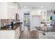 Modern kitchen featuring stainless steel appliances, granite counters and stylish cabinets at 202 Buttercup Ln, Summerville, SC 29486