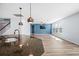 Open living area with hardwood floors, fan and plenty of natural light at 202 Buttercup Ln, Summerville, SC 29486
