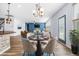 Staged living room featuring hardwood floors, recessed lighting, and modern decor at 202 Buttercup Ln, Summerville, SC 29486