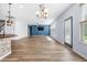 Bright and airy living room featuring hardwood floors and recessed lighting, perfect for relaxation at 202 Buttercup Ln, Summerville, SC 29486