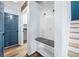 Mud room featuring coat hooks, storage bench and entry to laundry room at 202 Buttercup Ln, Summerville, SC 29486