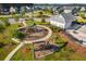Community playground, swing set, and sidewalks in a neighborhood with lush green space at 202 Buttercup Ln, Summerville, SC 29486