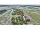 Stunning aerial view of marsh-front townhomes in a desirable waterside community at 202 Mariners Cay Dr, Folly Beach, SC 29439
