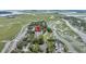 Breathtaking aerial view of waterfront community surrounded by green landscape at 202 Mariners Cay Dr, Folly Beach, SC 29439