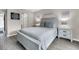 Relaxing bedroom features a comfortable queen bed, matching nightstands and calming colors at 202 Mariners Cay Dr, Folly Beach, SC 29439
