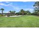 Community area with a large lawn, gazebo, outdoor furniture, and lush landscaping at 202 Mariners Cay Dr, Folly Beach, SC 29439