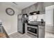 Functional kitchen with stainless steel appliances and ample cabinet space at 202 Mariners Cay Dr, Folly Beach, SC 29439