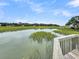 Beautiful view of marsh from wooden pier at 202 Mariners Cay Dr, Folly Beach, SC 29439