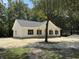 New construction with a welcoming exterior and a tree in the front yard at 216 Hill Dr, Summerville, SC 29483