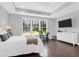 Beautiful bedroom with tray ceilings and a view of the outdoors at 217 Quimby Hill Dr, Huger, SC 29450