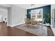 Modern dining room featuring wood table and chairs with view to yard at 217 Quimby Hill Dr, Huger, SC 29450