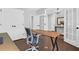 Spacious office with wood floors, neutral walls, and glass paneled doors at 217 Quimby Hill Dr, Huger, SC 29450